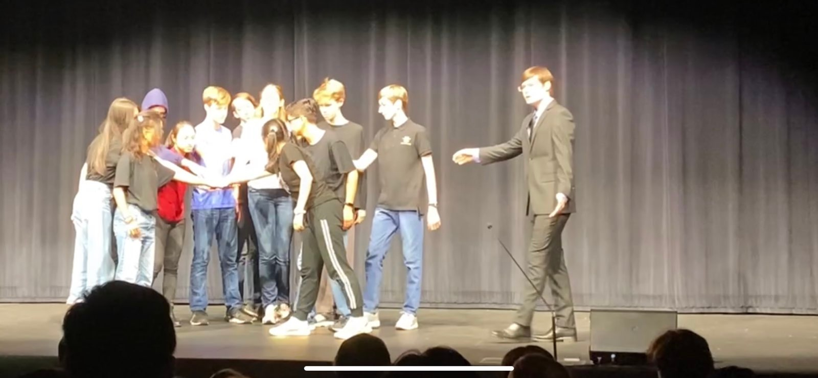 Me, performing as the 'Stage Director' (narrator) character in the play